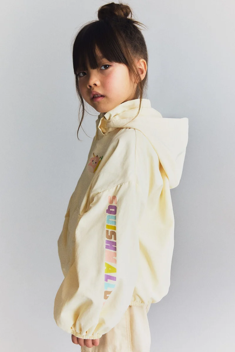 اتش اند ام جاكيت للحماية من الرياح مزين بطبعة