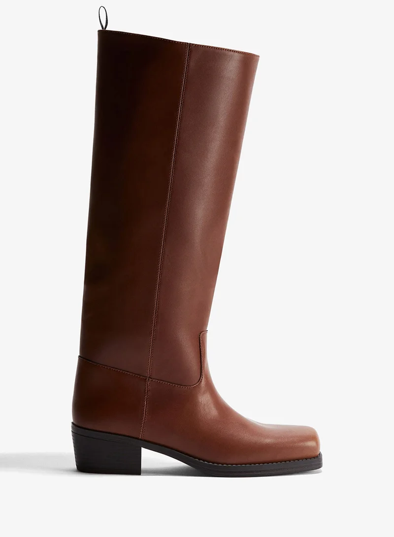 اتش اند ام بووت بايكر بطول الركبة