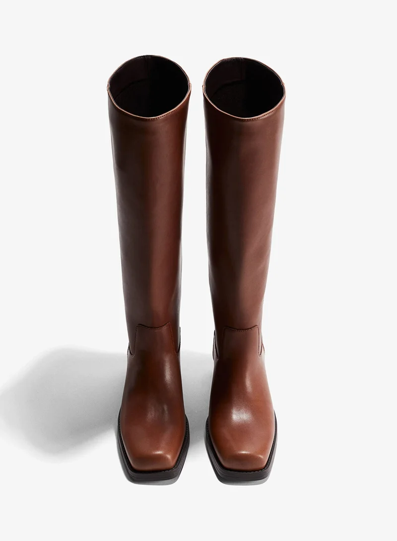 اتش اند ام بووت بايكر بطول الركبة