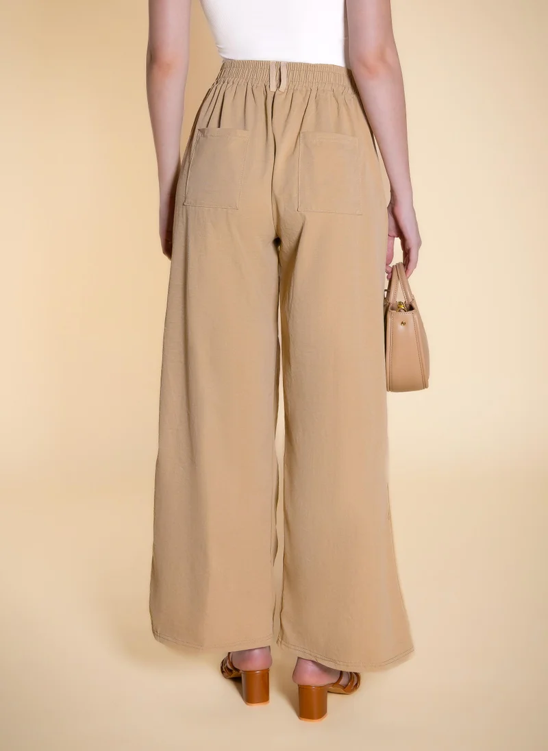 Shapes Beige PLEATED COMFORT TROUSERS for Women | Best Price UAE