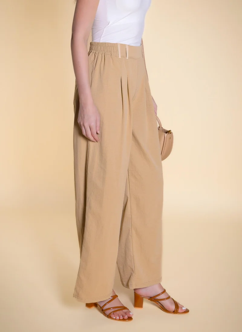Shapes Beige PLEATED COMFORT TROUSERS for Women | Best Price UAE
