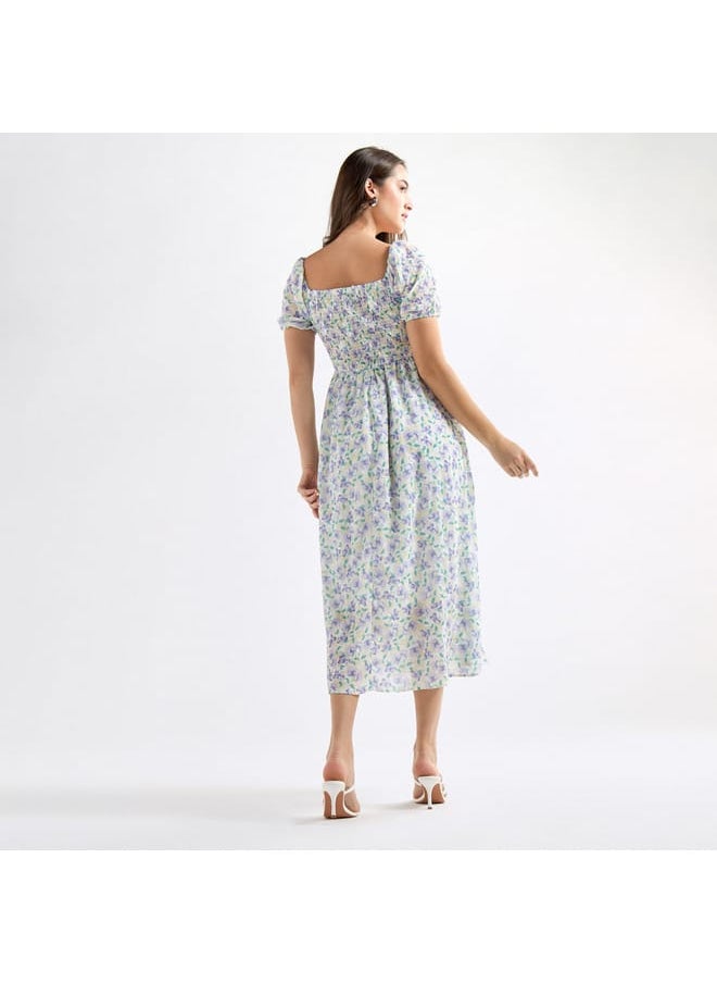 All-Over Floral Print A-line Dress with Ruffles and Shirred Detail - pzsku/ZD678D8797323E17C4413Z/45/_/1728433119/195bd073-b01f-4fd5-a01b-c81ebdee1209