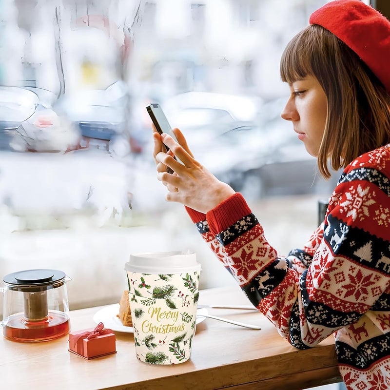بيوني مان عبوة من 50 كوب قهوة يمكن التخلص منها لعيد الميلاد بسعة 12 أونصة، أكواب قهوة للخارج بنقش الهولي مع أغطية وأكمام، أكواب شرب ورقية بنقش أوراق الهولي الشتوية للمشروبات الساخنة والباردة مثل الشوكولاتة والكاكاو والشاي، مستلزمات حفلات عيد الميلاد والأعياد - Image 5