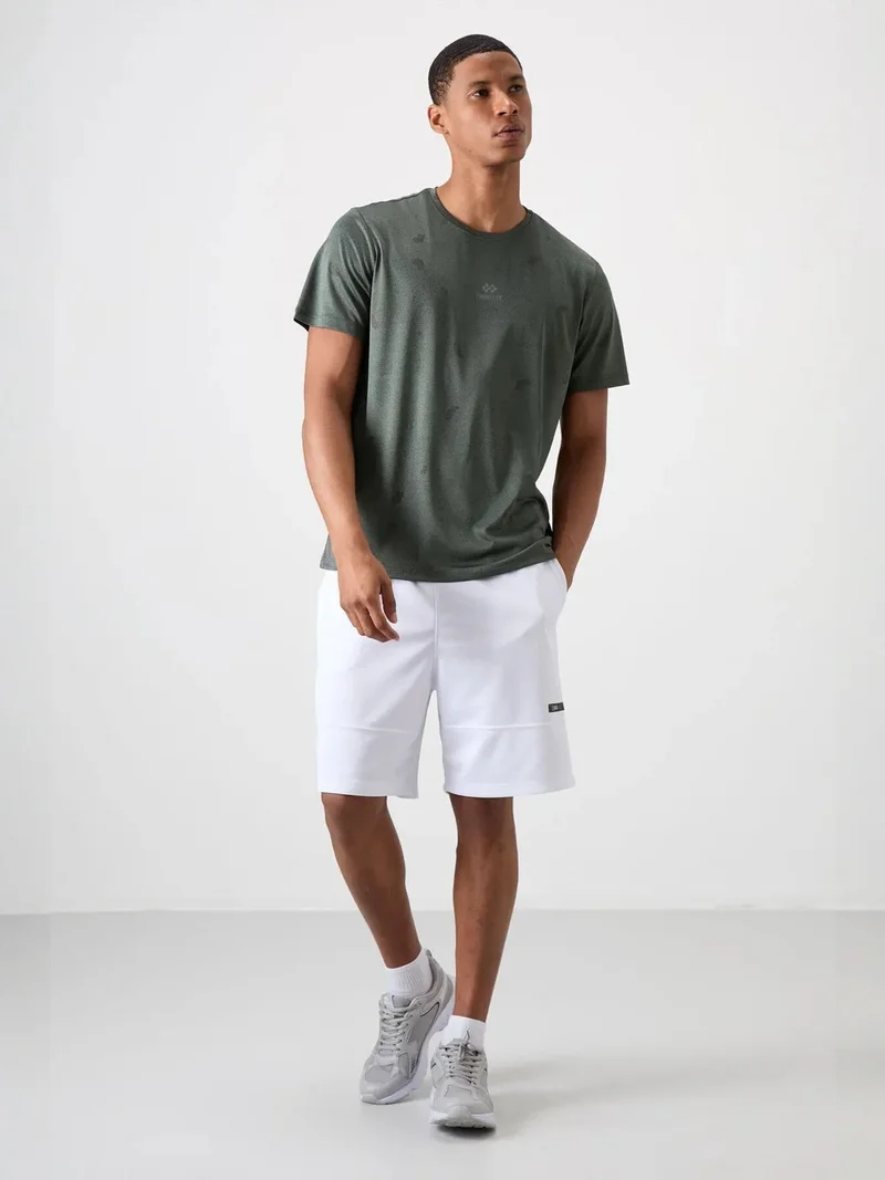تومي لايف TOMMY Men's Solid Bird's Eye Crew Neck T-Shirt