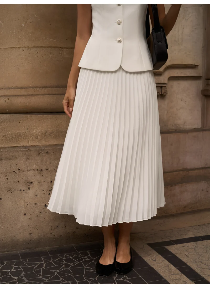 Lichi Pleated midi skirt in light fabric
