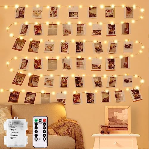 LECLSTAR Photo Clip String Lights with Remote, 33FT 100 LED Battery Operated String Lights, Waterproof Copper Wire Starry Lights with 50 Clear Clips, Powered Fairy Lights for Teen Girl Gifts Bedroom 8 Modes - Image 1