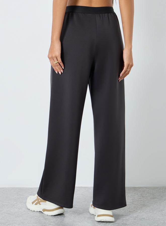 ستايلي بنطال سادة بقصة أرجل واسعة - Image 4