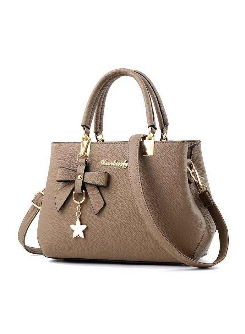 Fashionable new solid color shoulder bag with pink shoulder strap 