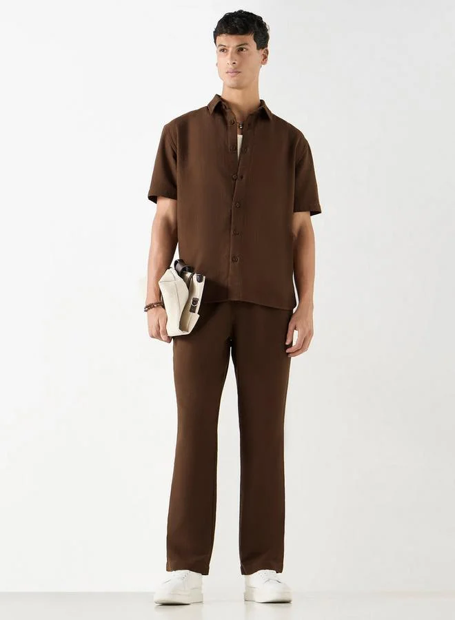 ايكونيك قميص بارز الملمس بأكمام قصيرة من آيكونيك