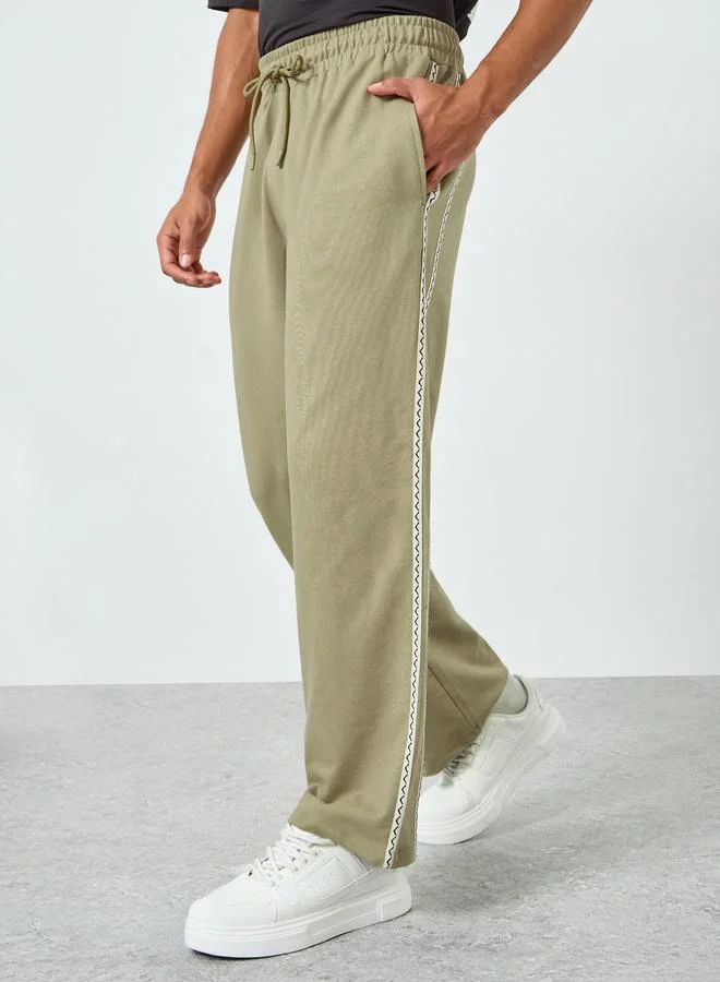 Black Oversized Zig Zag Side Tape Joggers