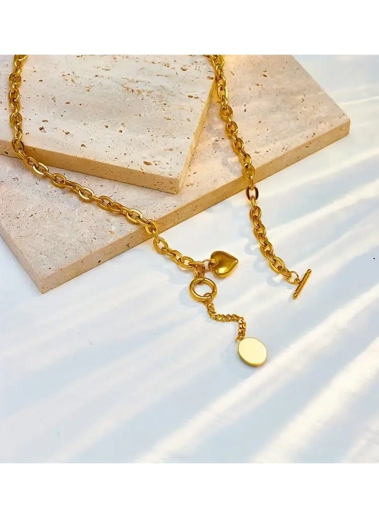 A Golden Stainless Steel Accessory with an 18K Gold-Plated Chunky Chain, Oval Tassel Pendant, Heart OT Buckle, And Titanium Steel Metal Necklace, Perfect for Creative, Stylish, And Trendy Looks. It'S Versatile for Everyday Wear, Street Gatherings, And Festive Parties, Making It an Ideal Gift for Women.