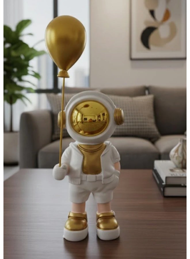 أي كي دي سي ديكور AKDC سيراميكي لرائد فضاء يحمل بالونًا، مقاس 20 سم، باللونين الأبيض والذهبي | لمسة ديكور منزلية أنيقة مستوحاة من الفضاء... - Image 2