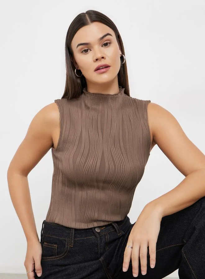 ستايلي بلوزة محبوكة مُجسمة بياقة عالية