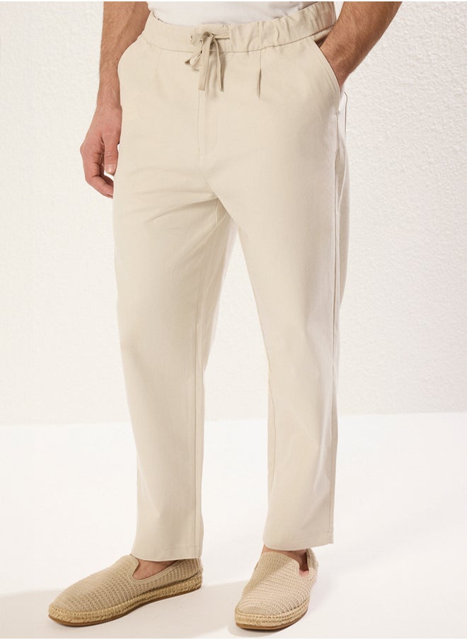 trendyol Stone Tapered Skinny Premium Textured Fabric Trousers  - Image 3