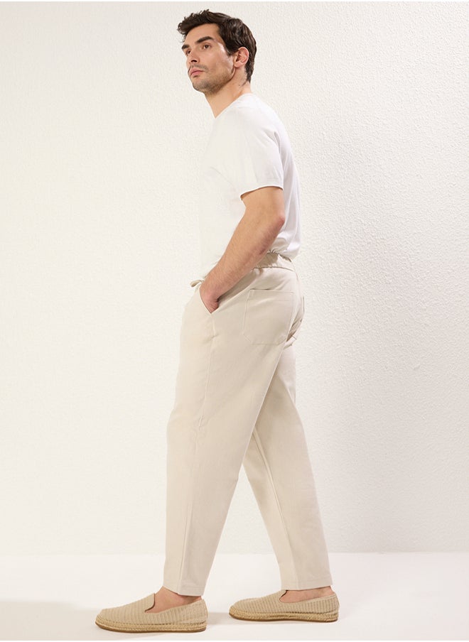 trendyol Stone Tapered Skinny Premium Textured Fabric Trousers  - Image 5