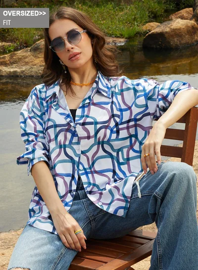 Campus Sutra Campus Sutra Women's Azure Blue Flowing Vines Shirt For Casual Wear | Spread Collar | Long Sleeve | Button Closure | Oversized Shirt Crafted With Comfort Fit For Everyday Wear