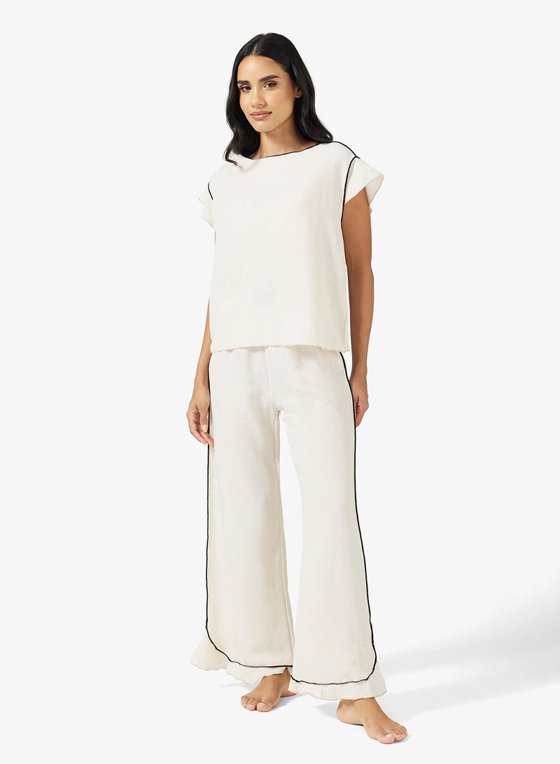 جينجر طقم علوي وبنطلون بيجامة بتفاصيل حواف متباينة - Image 1