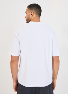 Styli Micro Pique Knit Oversized T-Shirt with Reflective Logo  - Image 4