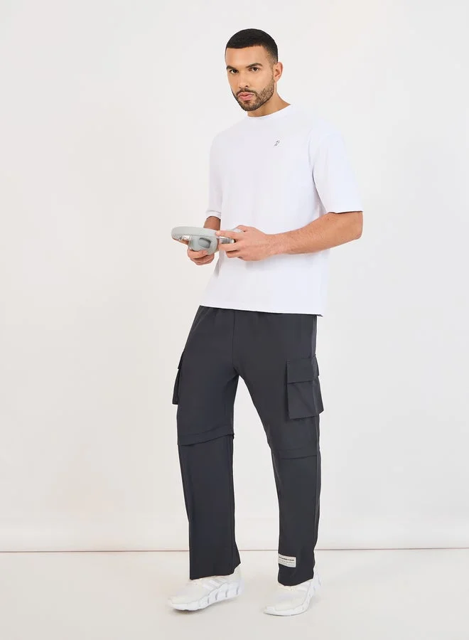 Styli Active Micro Pique Knit Oversized T-Shirt with Reflective Logo