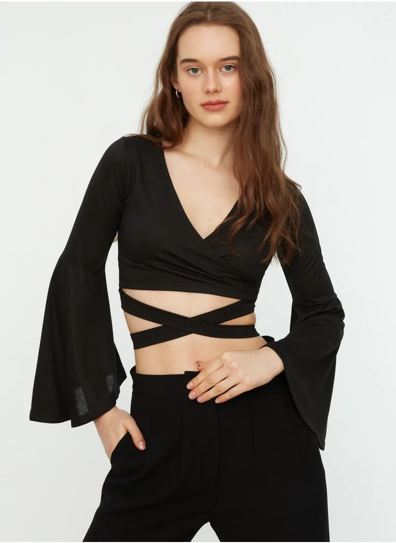 trendyol Cross Strap Flute Sleeve Top