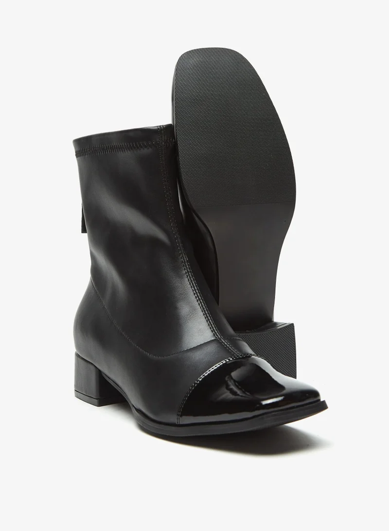فلورا بيلا من شو إكسبرس Womens Solid Boots With Zip Closure And Block Heels By Shoexpress