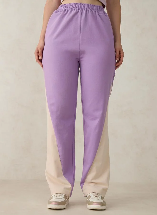 Outzidr  Purple Cut And Sew Panel Color Block Joggers for Women | Best Price UAE