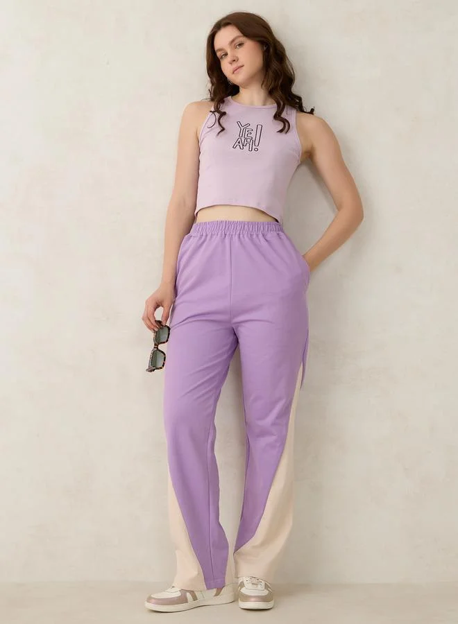 Outzidr  Purple Cut And Sew Panel Color Block Joggers for Women | Best Price UAE