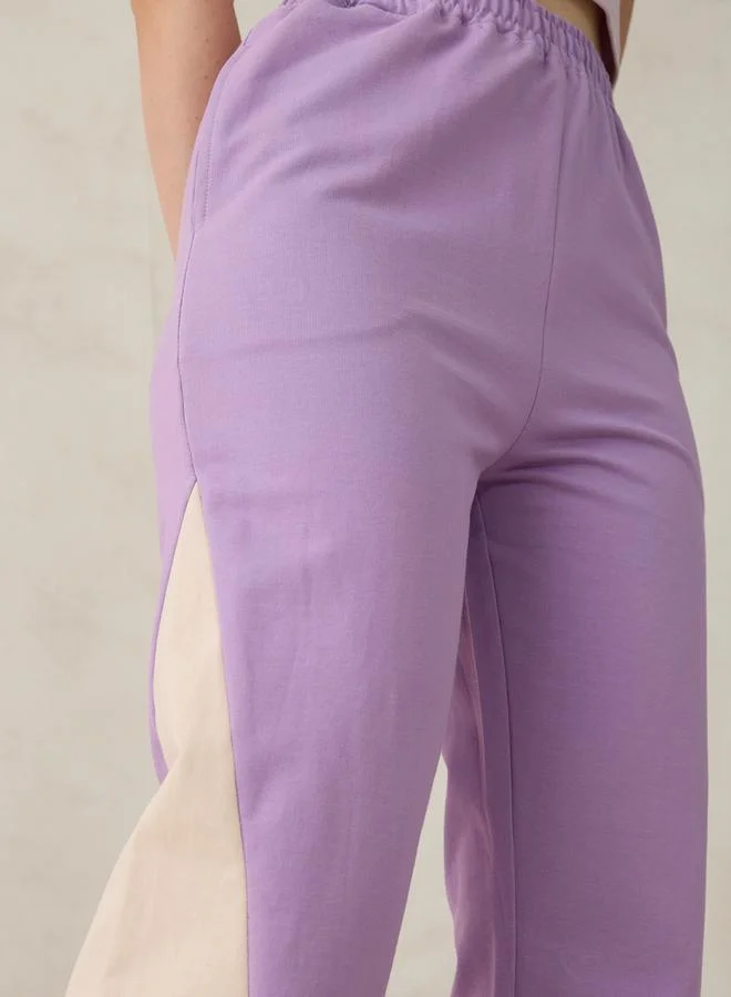 Outzidr  Purple Cut And Sew Panel Color Block Joggers for Women | Best Price UAE
