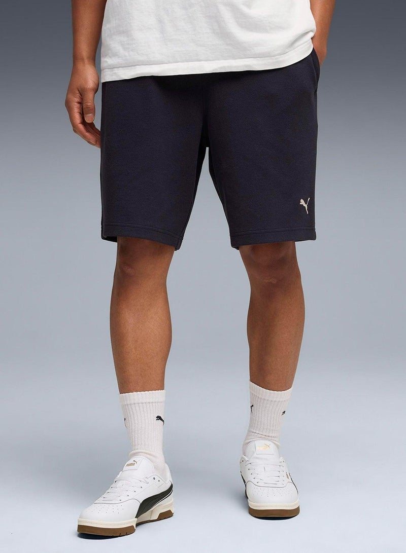 PUMA 9" Essential Elevated Relaxed Shorts - Image 1