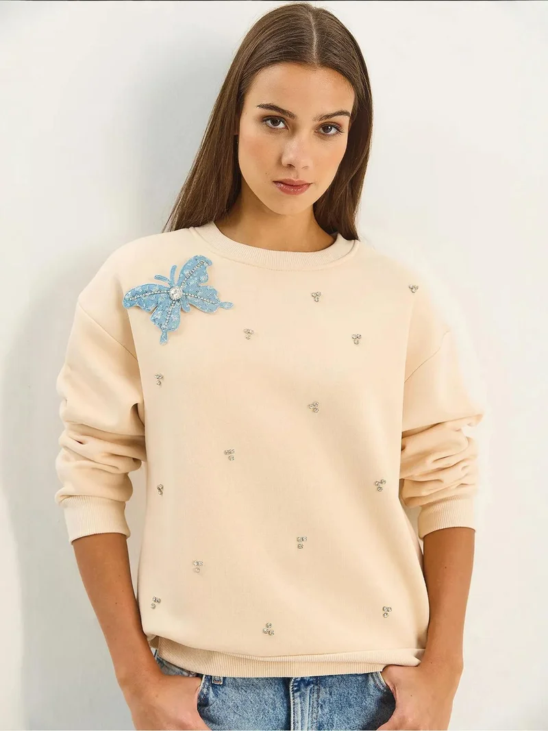 Bianco Lucci LUCCI Embroidered Crew Neck Long Sleeve Sweatshirt