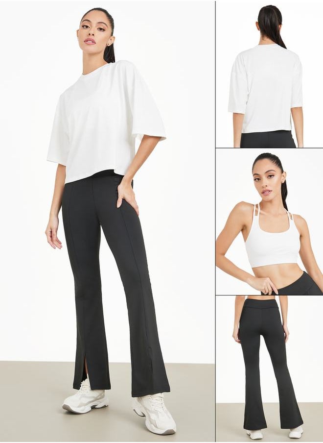 Styli - Pack of 3 - Boxy Fit Drop Shoulder Crop Top, Multi Strap Sports Bra with Back Mesh Insert & Solid Front Flit Pants Set - Image 1