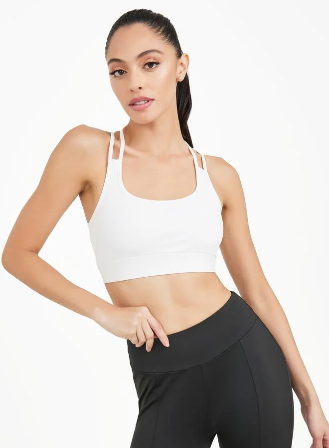 Styli Active Multicolour Pack Of 3 - Boxy Fit Drop Shoulder Crop Top- Multi Strap Sports Bra And Solid Front Slit Pants for Women | Best Price UAE