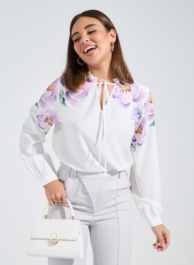 Styli Floral Placement Print Tie-Up Neck Blouse - Image 1