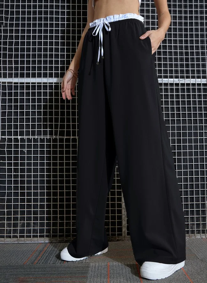 SASSAFRAS Black Loose Fit High-Rise Parallel Trousers for Women