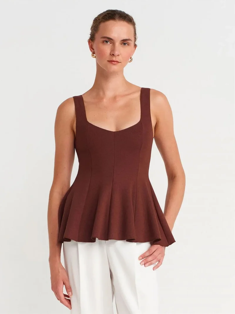 ديلفين Dilvin Sleeveless Ribbed Peplum Blouse