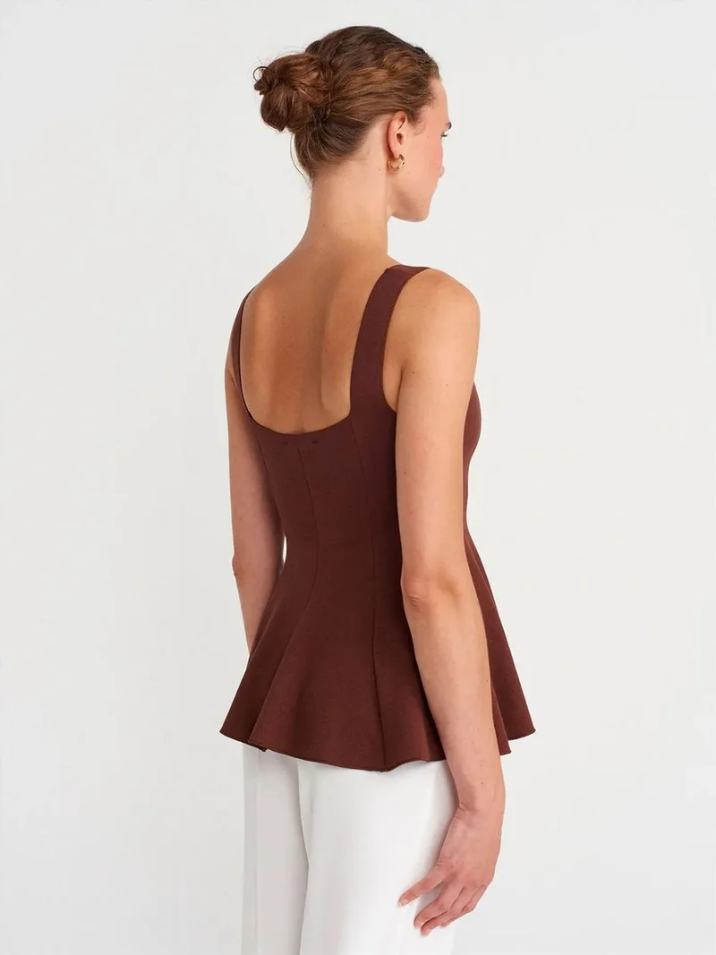 ديلفين Dilvin Sleeveless Ribbed Peplum Blouse