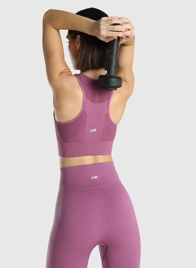 Musclemind pink Seamless Sports Bra for Gym Workout and Fitness with rib structure for Posture Assistance, anti-odour, anti-microbial, 4 way stretch, wide straps with removable pads, offers medium support, super soft fabric mesh with quick drying activewear for Women | Best Price UAE