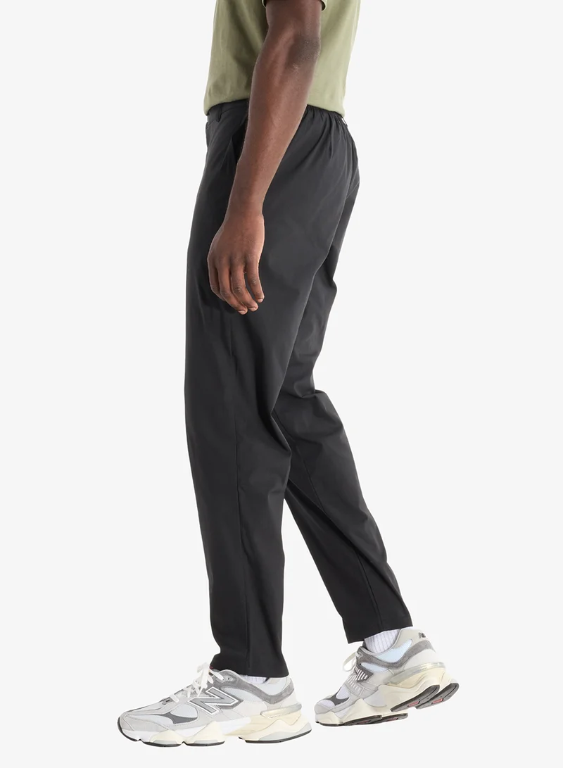 New Balance BLACK (BK) 30" Athletics Standard Tapered Sweatpants for Men | Best Price UAE
