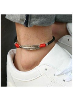 Anklet of natural black leather decorated with a piece of silver steel