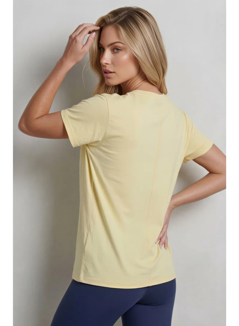 ملابس رياضية من كور Performance Tee - Pale Yellow