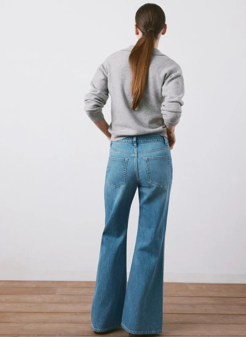 MANGO Mid-rise flared jeans