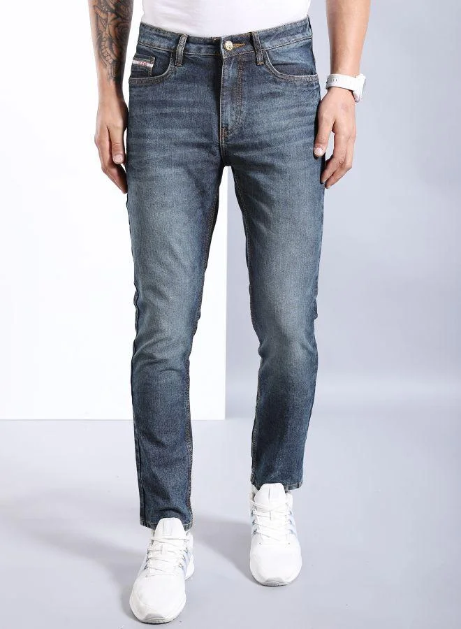 ذا انديان كراج كو Men Slim Fit Solid Mid-Rise Stretchable Jeans