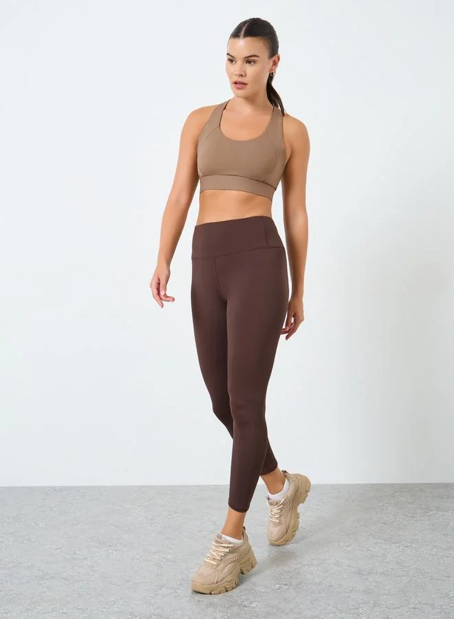 Styli Active Peep Racerback Hook and Eye Seam Detail Sports Bra