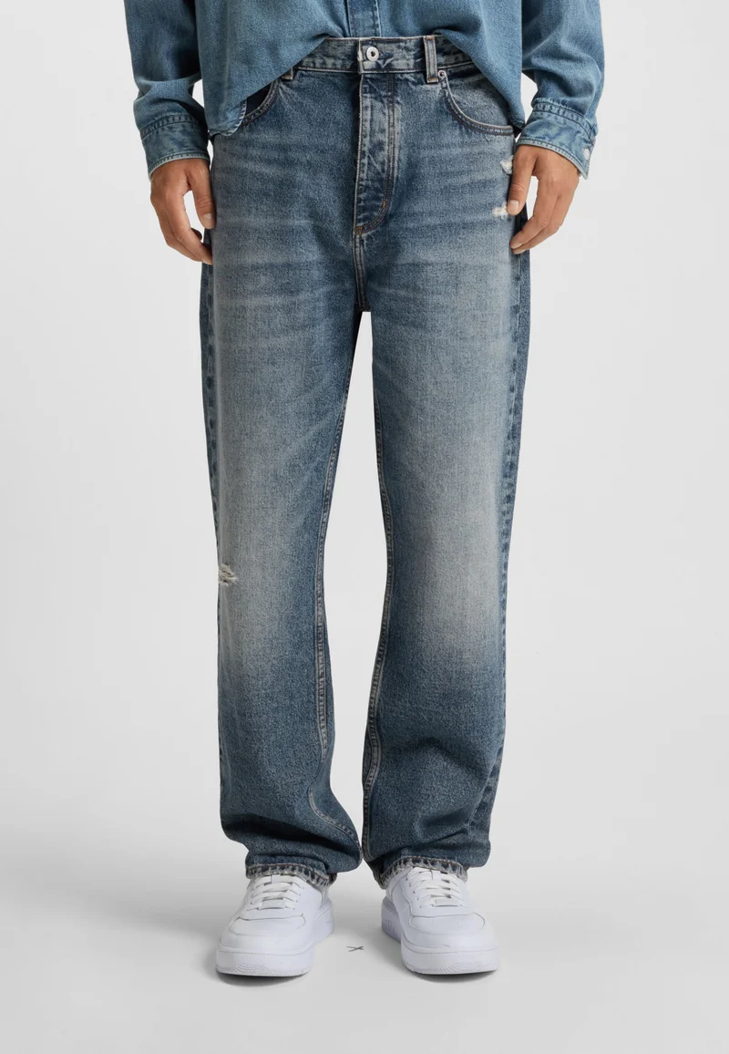HUGO Baggy-fit jeans in blue distressed denim