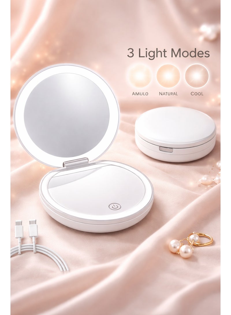 مرآة مكياج LED محمولة بثلاثة مستويات سطوع، تتميز بغطاء قلاب وتصميم دائري قابل للطي. جانب واحد يوفر تكبيرًا، وتتضمن خيارًا شحن USB - Image 1