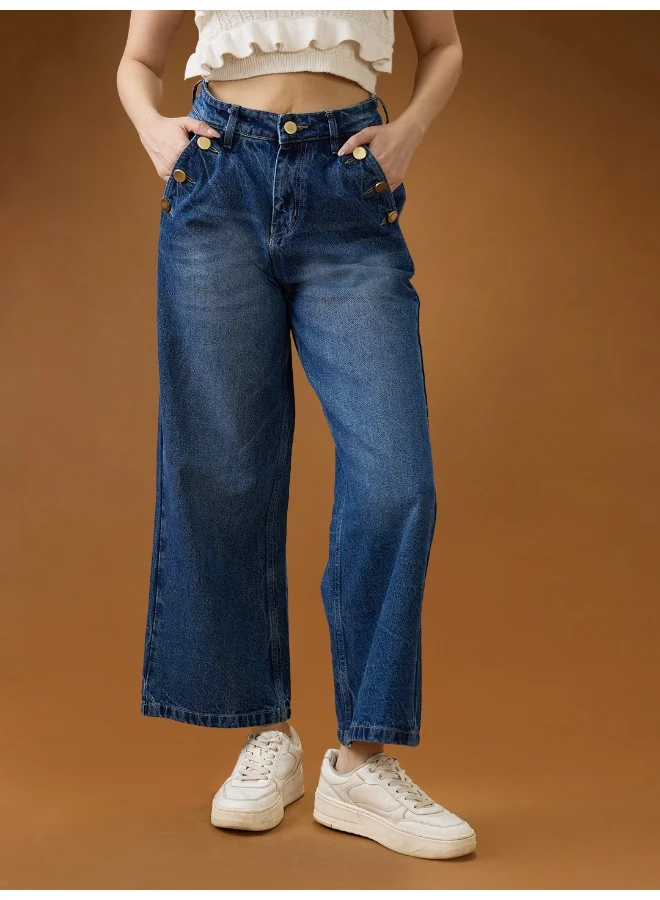 جلو باص جينز نسائي واسع الساق بخصر متوسط وتأثير الشارب من القطن باللون الأزرق المتوسط