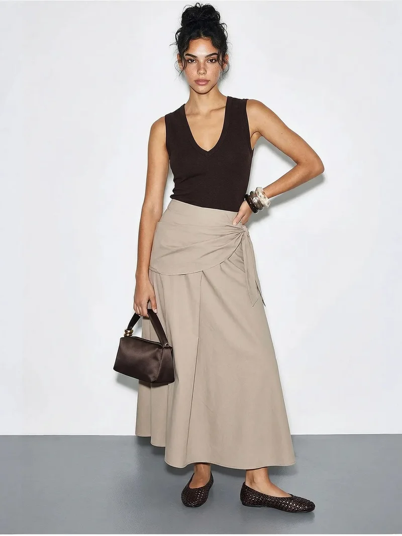 بيانكو لوتشي LUCCI High Waist A-Line Wrap Skirt with Tie Detail
