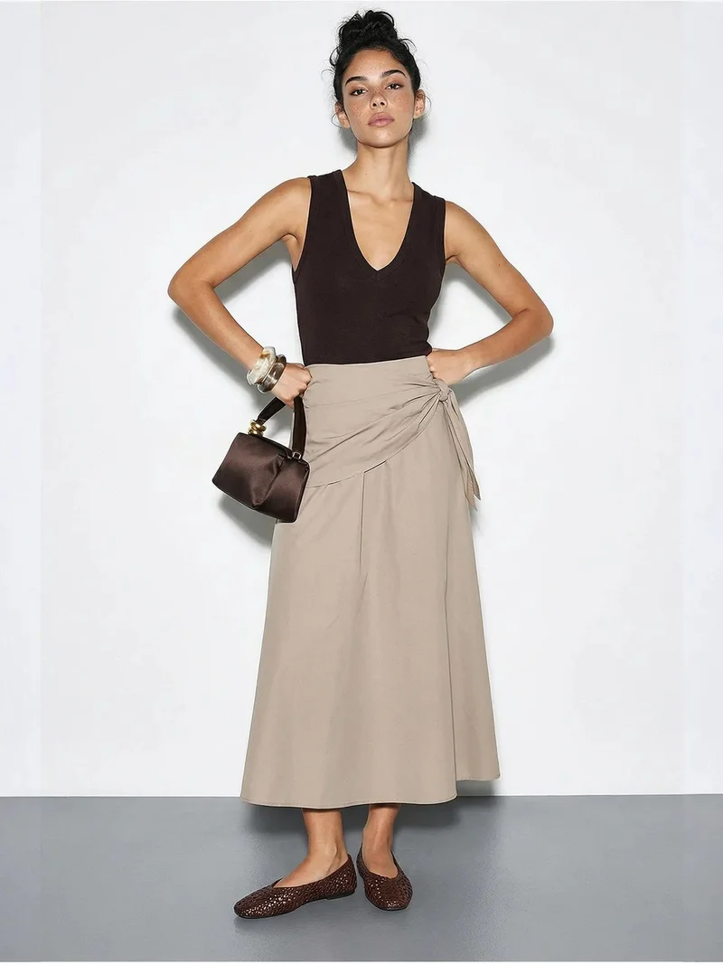 بيانكو لوتشي LUCCI High Waist A-Line Wrap Skirt with Tie Detail