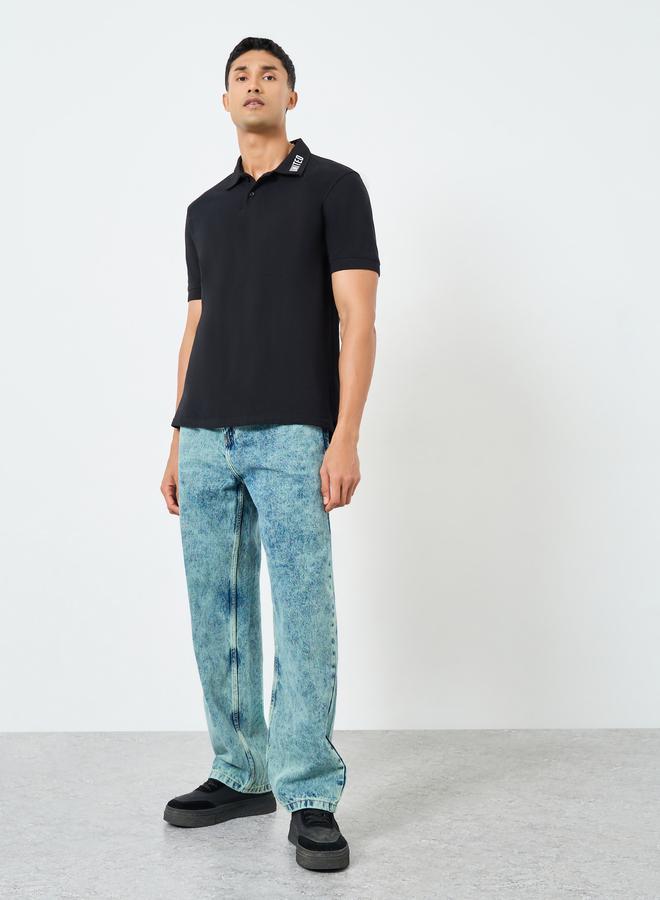 ستايلي بولو مطبوع بتفاصيل بيكيه بقصة مريحة - Image 2