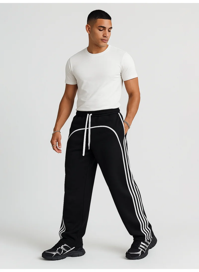 Maniac  Maniac Mens Side Stripe Black and White Cotton Baggy Fit Trackpant for Men | Best Price UAE